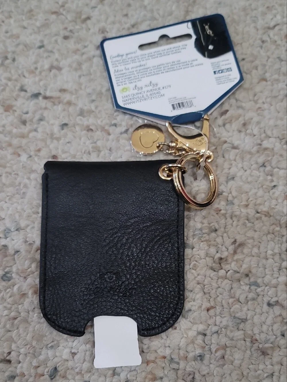 Itzy Ritzy Black Hand Sanitizer Case with Gold Clip